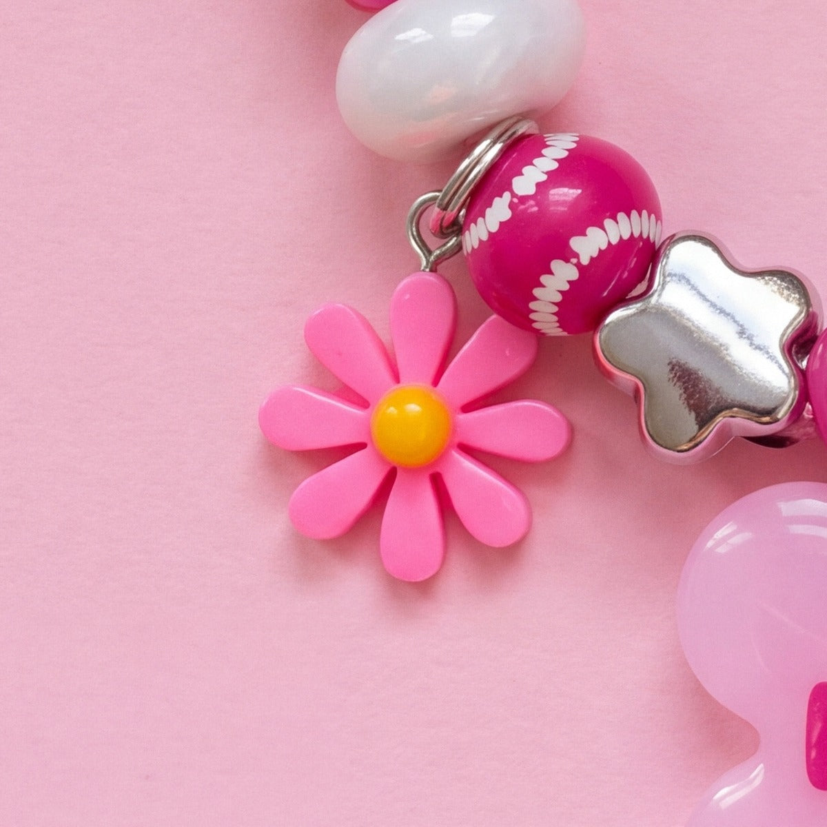 BEADBOO Pink Daisy charm hanging on a handmade beaded dog collar [crop:charm-flower-pink__kkuymi]