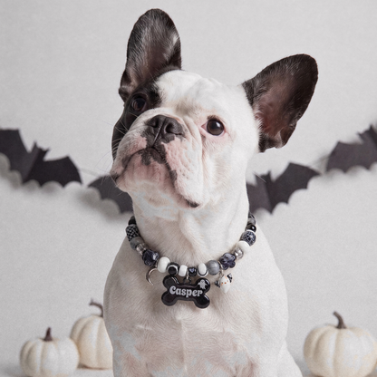 Ghostling beaded dog necklace — black and white beads, silver moon and ghost charms, black bone name tag