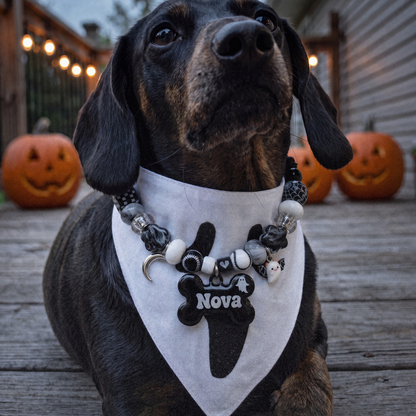Ghostling beaded dog necklace — black and white beads, silver moon and ghost charms, black bone name tag