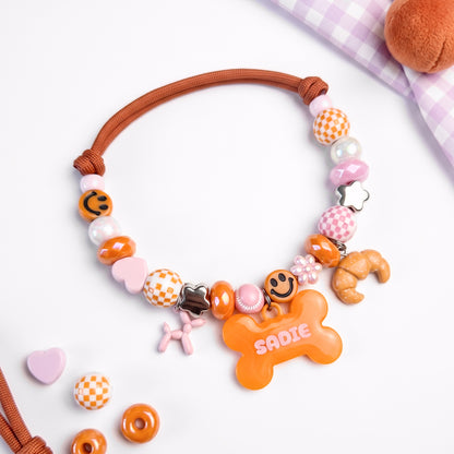 Foxy Roxy orange beaded dog collar necklace with bone name tag