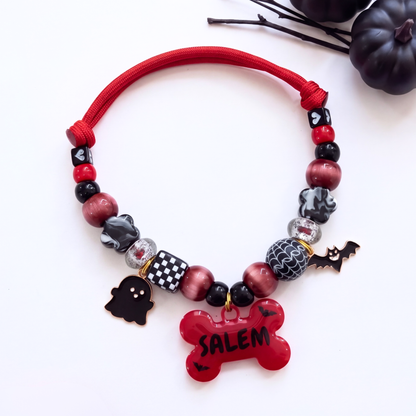 Vampup beaded dog necklace — cherry red and black beads, ghost and bat charms, red bone name tag with little bats